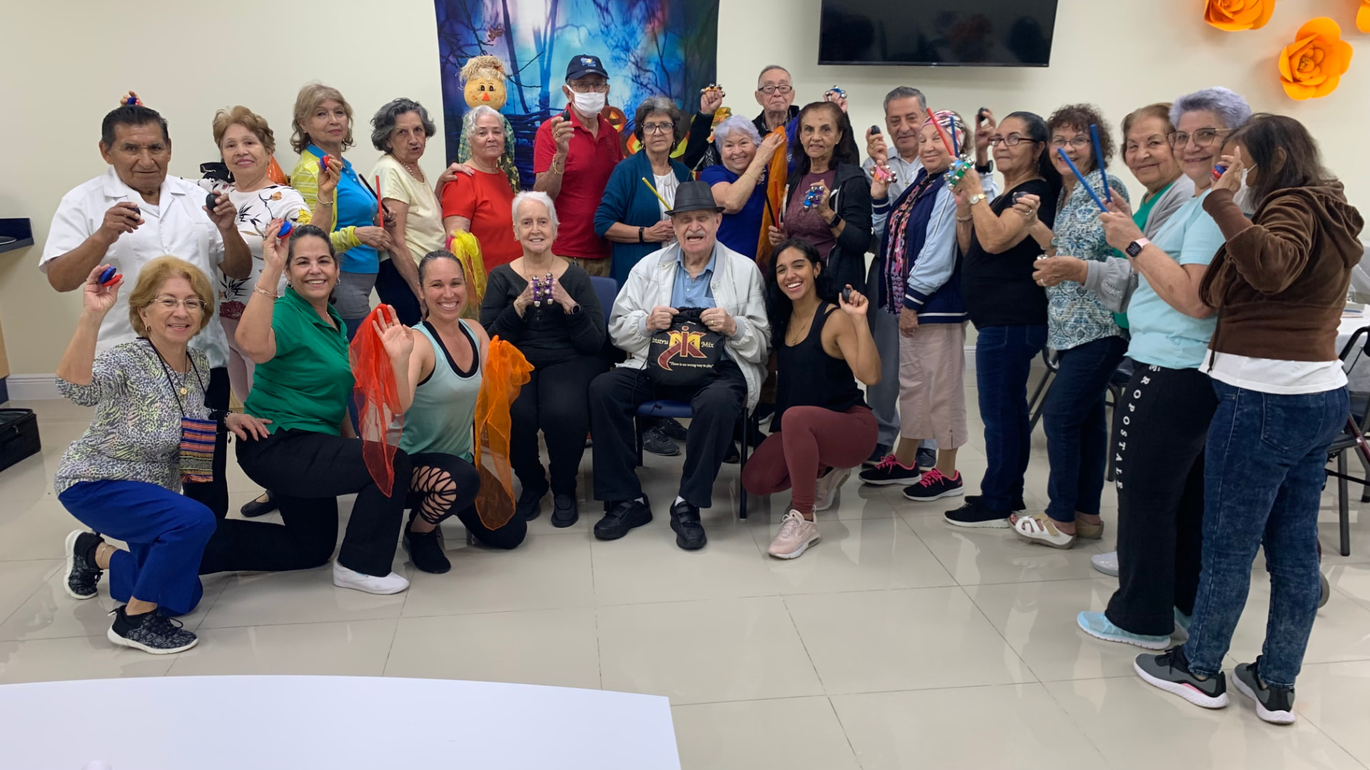 A full class group celebrating together after an InstruMix session
