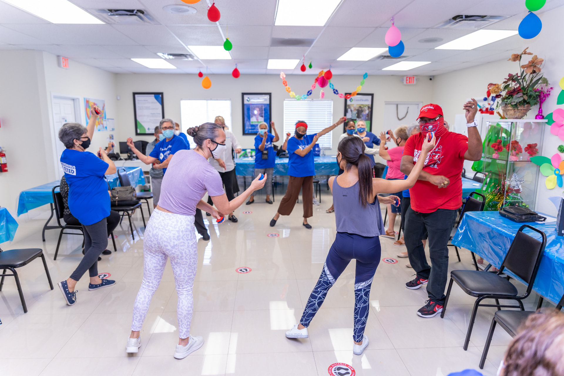 Older adults moving together during an InstruMix class